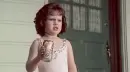 girl crushes pop can showing strength