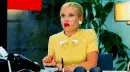 lady falls backwards in chair