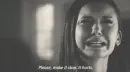 sad lady crying saying "Please make it stop, it hurts"