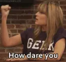 lady shaking hand "How Dare You"
