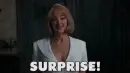 lady saying "SURPRISE"