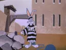 bugs bunny in prison hitting rock with hammer