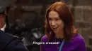 excited lady with saying "Fingers Crossed!"