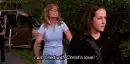 angry lady throwing shoe saying "I am filled with christs love"