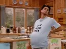 man walking with shirt saying "Bun In The Oven"