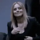 putting on lipstick