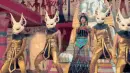 dressed up in egyptian costumes dancing
