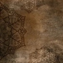 BROWN BACKGROUND WITH MANDALA ON IT