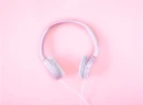 Pink background with headphones