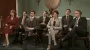 room of people raising their hand