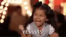 little girl saying "yes"