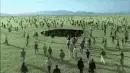 people running into a black hole in the earth