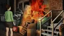 man with gas can, burning dumpster