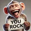 Monkey with a sign that says YOU ROCK
