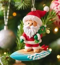 Santa on a Surfboard hanging tree ornament