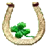 Gold horseshoe with shamrock