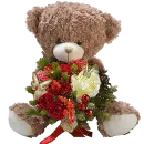 teddy bear holding bouquet