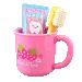 toothbrush, paste and cup