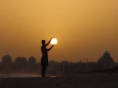 a man with the fire ball