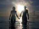 Girl And Guy At The Beach