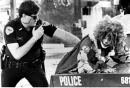 Police arresting clown