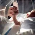 baby in incubator