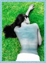 chick with a cloud covered back