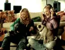 Aly and Aj with puppies