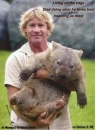 Steve Irwin and a baby tiger :)