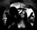 vampire guy feeding on his girl 