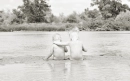 Girls Sitting at the River