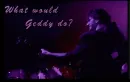 Geddy Lee playing bass guitar