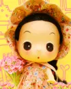 DDUNG DOLL WITH FLOWERS