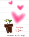 you make me happy : plant in a pot with hearts