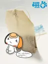 doggie near the tea bag