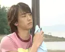 Bi cleans the lamppost