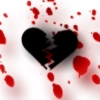 broken black heart with blood