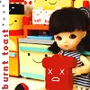 doll with toast