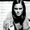 model holding cigaratte