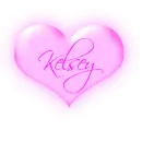 Kelsey in a pink flashing heart