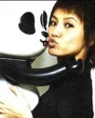 girl kissing a panda