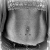 Belly with piercings