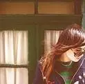 girl in front of window
