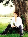 Gackt Sitting Near A Tree.