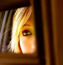 eye in car mirror