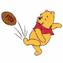 Pooh bear kicking a football
