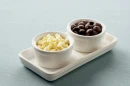 White and black chocolate in cups