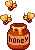 honey with bees flying around