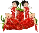 2 Betty Boops in red sitting on strawberries