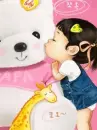 cute kawaii chubby lil girl with a big teddy bear kissing